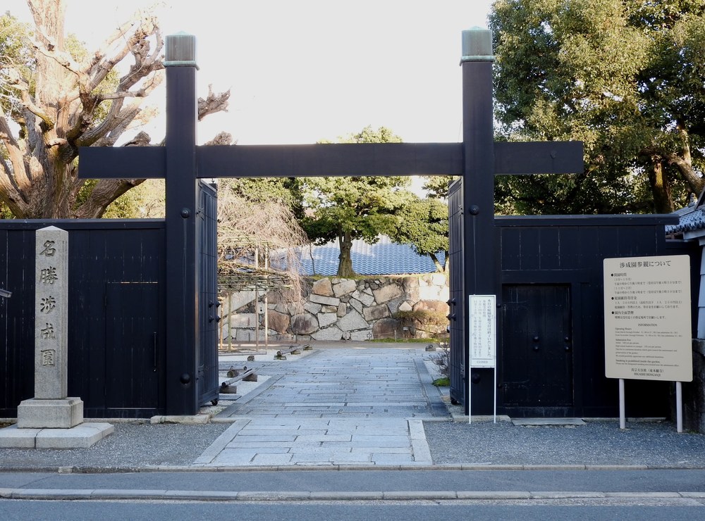 The black timber gate of Shosei-en garden in Kyoto